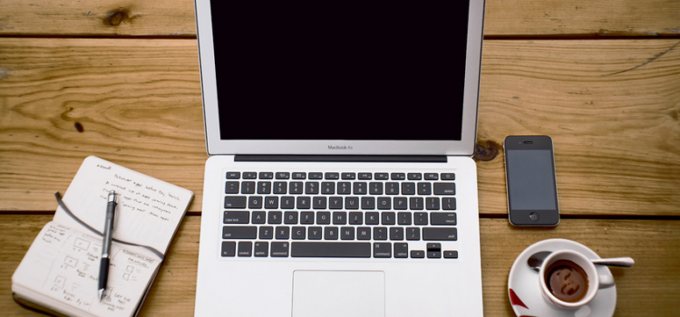 Mac Book Air and a cup of Coffee Mac Book Air and a cup of Coffee